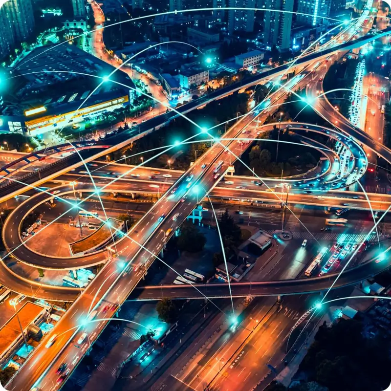 A highway with cars and floating fluorescent lights